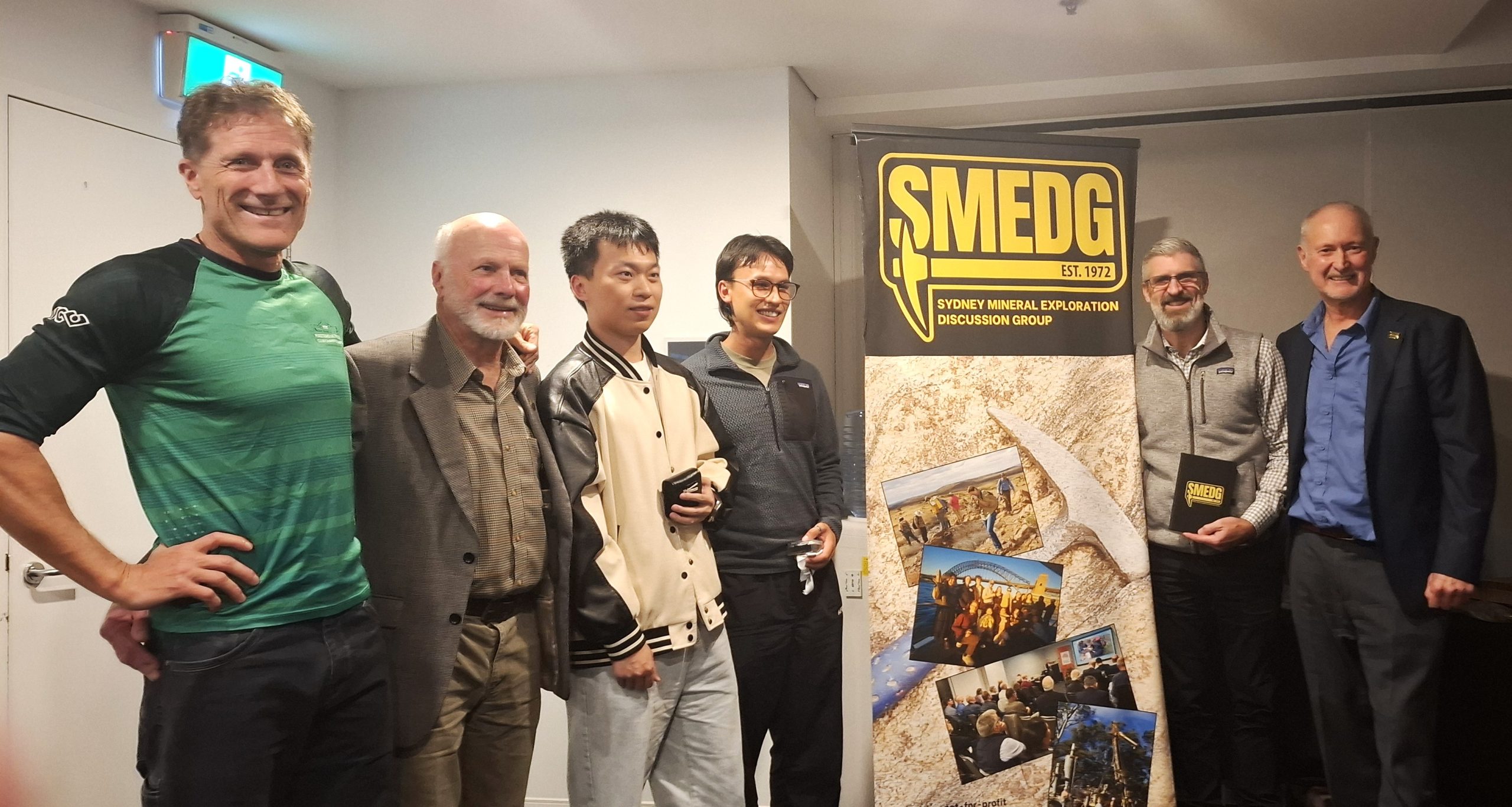 Student raffle prize-winners and SMEDG Committee members at May 2026 meeting